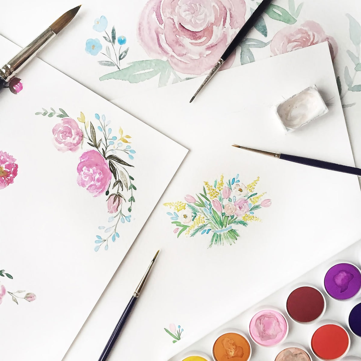 Watercolour paints and botanical artwork