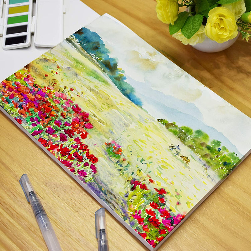 A picture of a field painted on an A3 Pencilmarch student watercolour paper pad with 300 gsm paper and 30 pages - Stationery Island