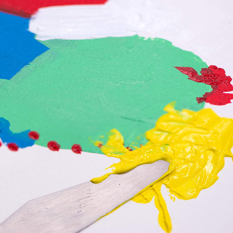 Coloured paint messily spread on a white background - Stationery Island