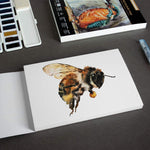 A picture of a bee painted on an A5 Pencilmarch artist watercolour paper pad with 300 gsm paper and 30 pages - Stationery Island