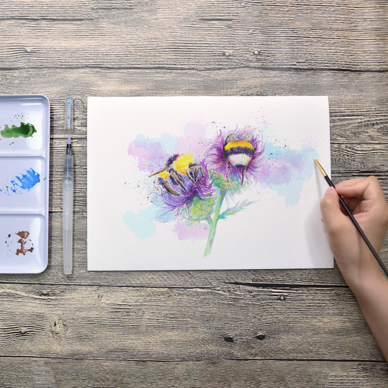 Colours from the 12 colours artist series watercolour paint set, used to create a painting of bees on a flower - Stationery Island