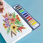 Colours from the 12 colours artist series watercolour paint set, used to create a painting of flowers - Stationery Island