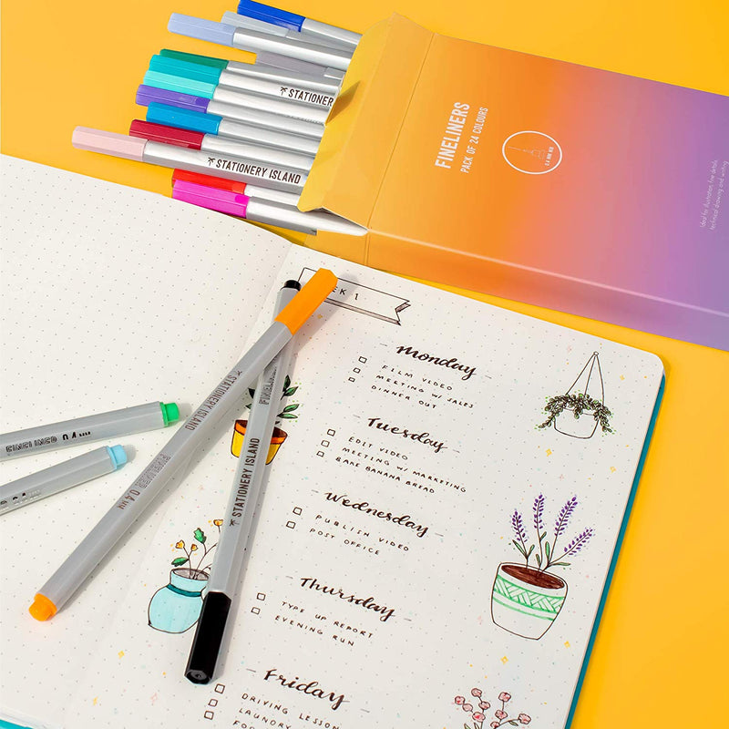 Coloured fineliner pens used to write a list of plans for the week in a book - Stationery Island