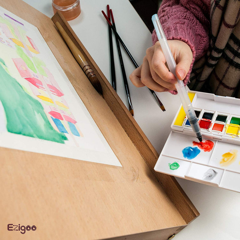 A person using the aqua brush from the Ezigoo watercolour paint set that has 12 colours, to paint a picture - Stationery Island