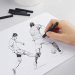 2 people playing football being drawn using charcoal sticks - Stationery Island