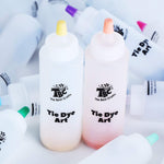 Coloured bottles, with dye inside of the TBC tie dye art party kit - Stationery Island