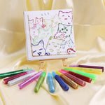 Different colours of TBC glitter glue pens used for a drawing - Stationery Island